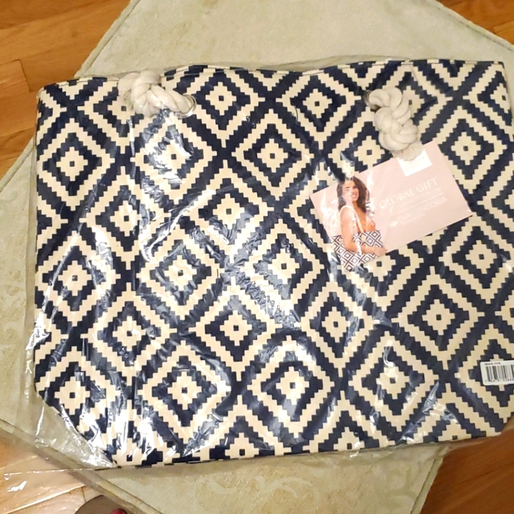 Eva Longoria navy and cream tote